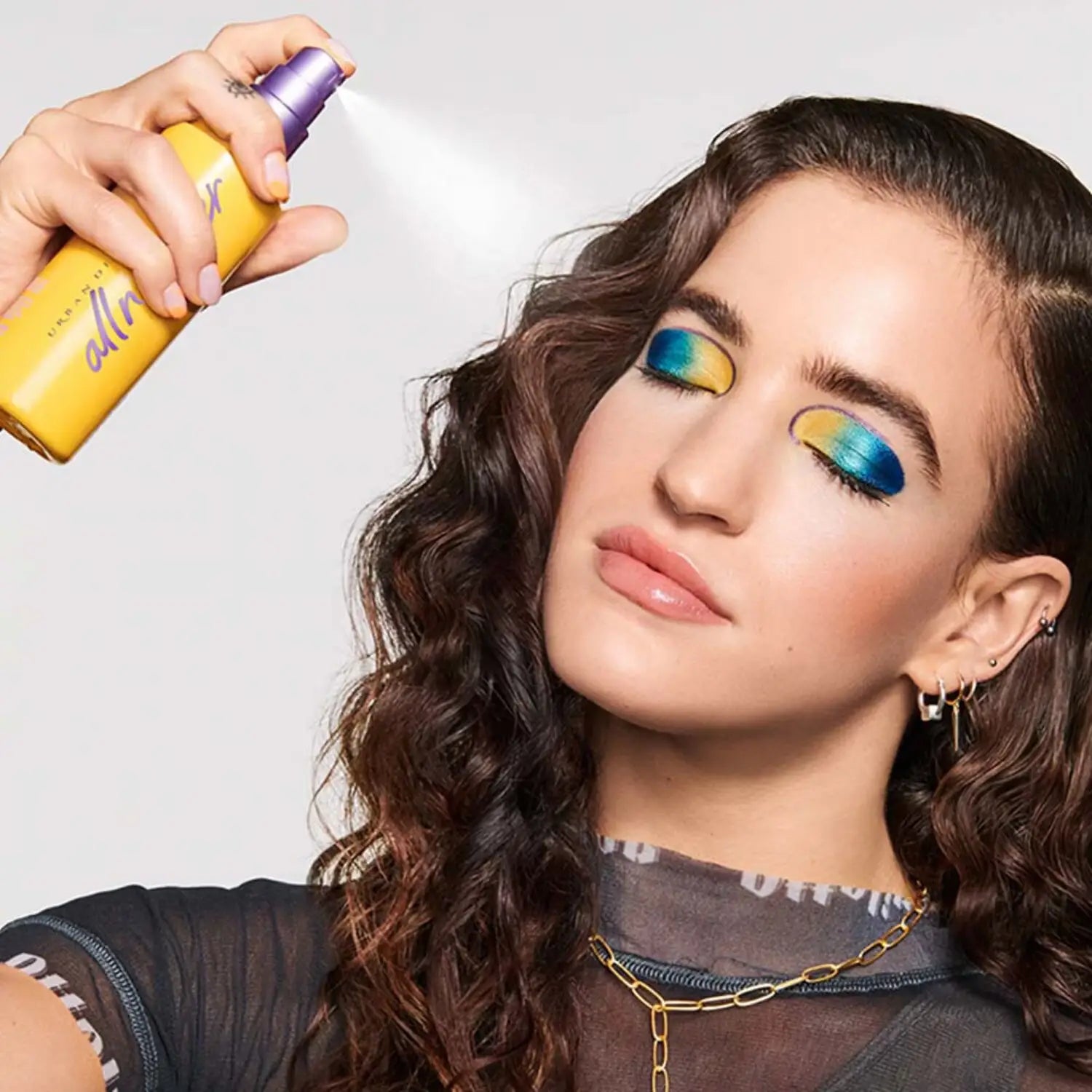 Model with a natural radiant glow after using All Nighter Vitamin C Makeup Fixer Spray