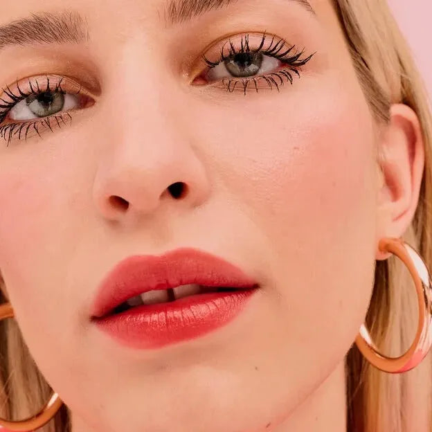 Close-up of a model's cheeks with Benefit Floratint blush application - natural flush