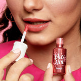 Benefit PlayTint lip and cheek stain closeup of bottle with pink liquid and cap