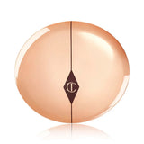 Charlotte Tilbury Airbrush Flawless Finish Powder Fair open compact showing powder pan and applicator