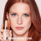 Charlotte Tilbury Airbrush Flawless Foundation pump action and product drop
