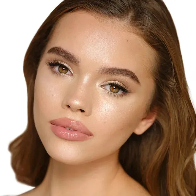 Champagne Glow highlighter swatch on skin