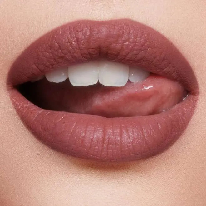 Charlotte Tilbury Pillow Talk Medium lipstick tube and swatch on fair skin