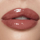 Model wearing Charlotte Tilbury Pillow Talk Big Lip Plump Medium-Deep lip gloss
