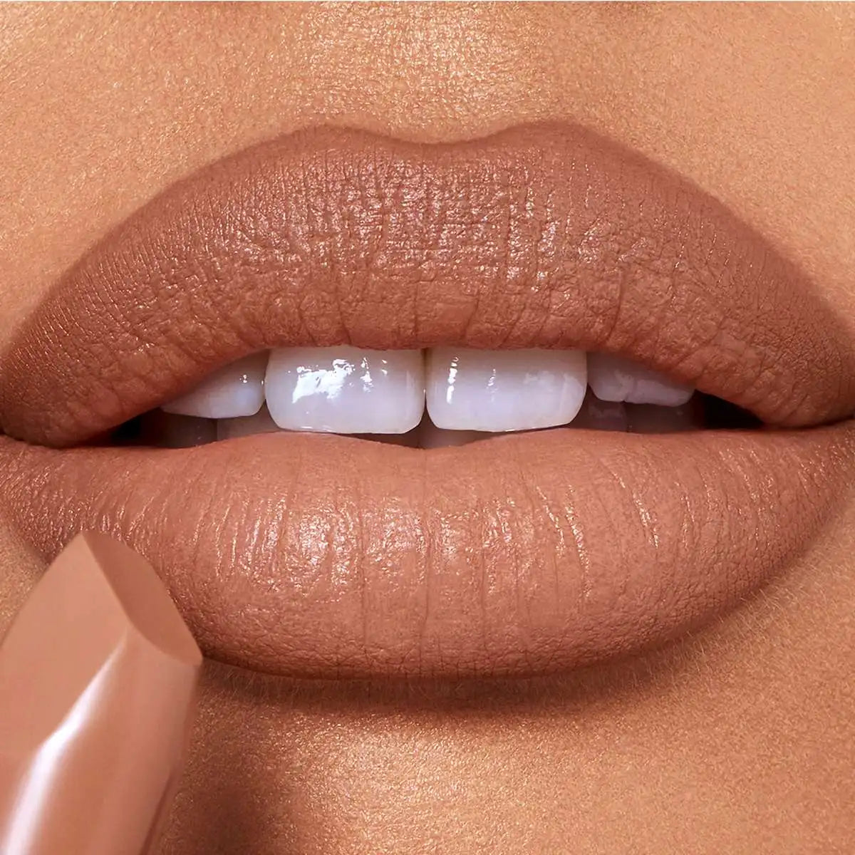 Charlotte Tilbury Cover Star lipstick paired with Lip Cheat liner in matching shade