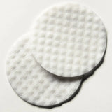 Elemis Dynamic Resurfacing Facial Pads pads on a blue surface
