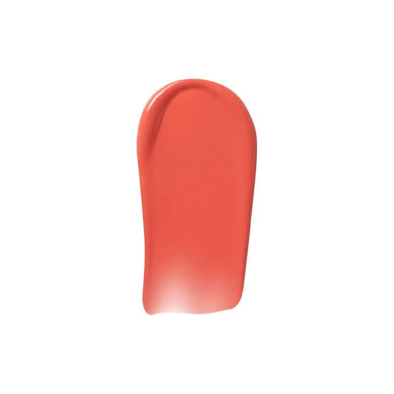 Swatch of E.L.F. Camo Liquid Blush Coral Crush on skin showing dewy finish and bright coral color