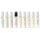 Lifestyle flat lay of Ellis Brooklyn Biography Fragrance Discovery Set with natural elements showcasing luxury clean perfume aesthetic
