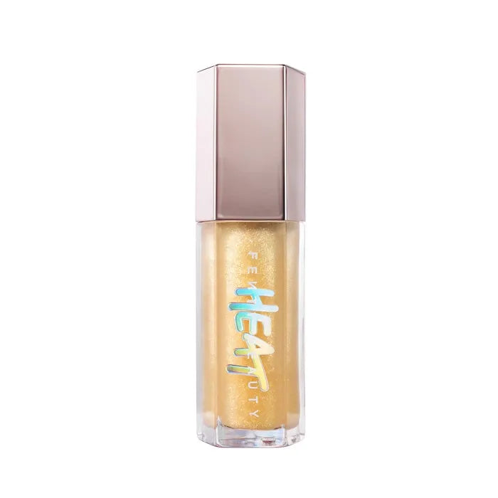 Fenty Beauty Gloss Bomb Heat Lip Luminizer Plumper in Lemon Lava, a high-shine, plumping lip gloss for radiant, fuller lips.