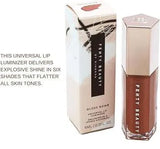 Fenty Beauty Gloss Bomb Fenty Glow - lip swatch on model showing glossy finish