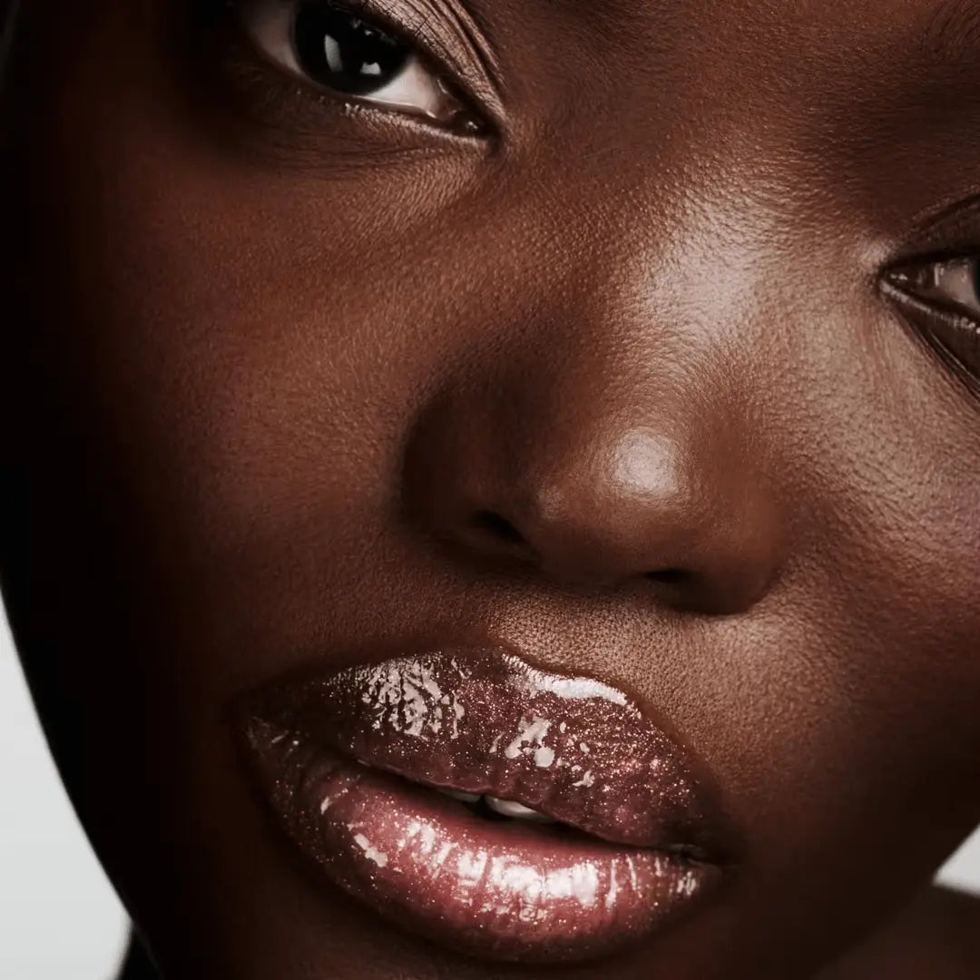 Fenty Beauty Gloss Bomb Hot Chocolit Fantasy alongside other gloss shades