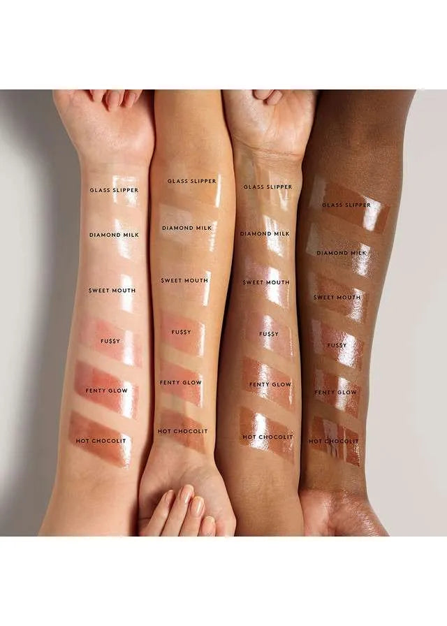Close-up of Fenty Beauty Gloss Bomb Heat applicator with gloss texture