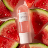Watermelon Glow Ultra-Fine Mist ingredients and key components on marble surface