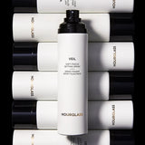 Hourglass Veil Soft Focus Setting Spray bottle with mist spray in action