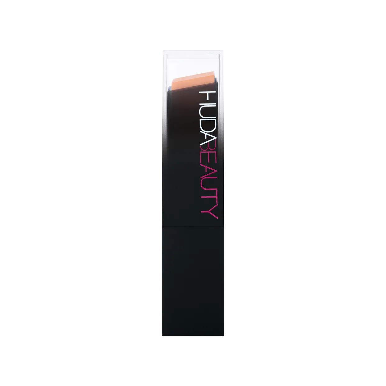 Huda Beauty foundation stick 315B Shortcake next to other makeup products for comparison