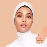 Close-up of Huda Beauty FauxFilter Skin Finish stick foundation in shade Shortcake showing texture