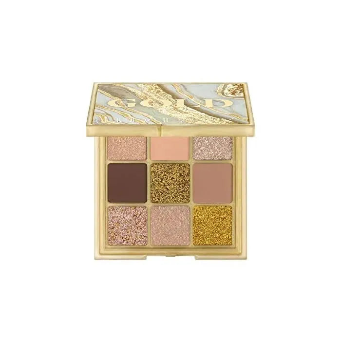 Huda Beauty Gold Obsessions eyeshadow palette front view with gold packaging and mirror