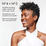 Applying Olaplex Nº.5 Conditioner from mid-lengths to ends