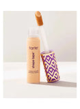 Swatch of Tarte Shape Tape Concealer in 27S Light Medium Sand on light-medium skin, demonstrating smooth texture and full, natural matte coverage.