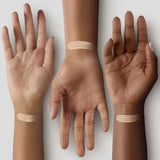 Close-up of Too Faced Born This Way Super Coverage Concealer tube in Swan, highlighting the doe-foot applicator for precise application.