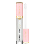 Too Faced Lip Injection Power Plumping Lip Gloss Stars Are Aligned shade swatch on lips showing rosy gold shimmer