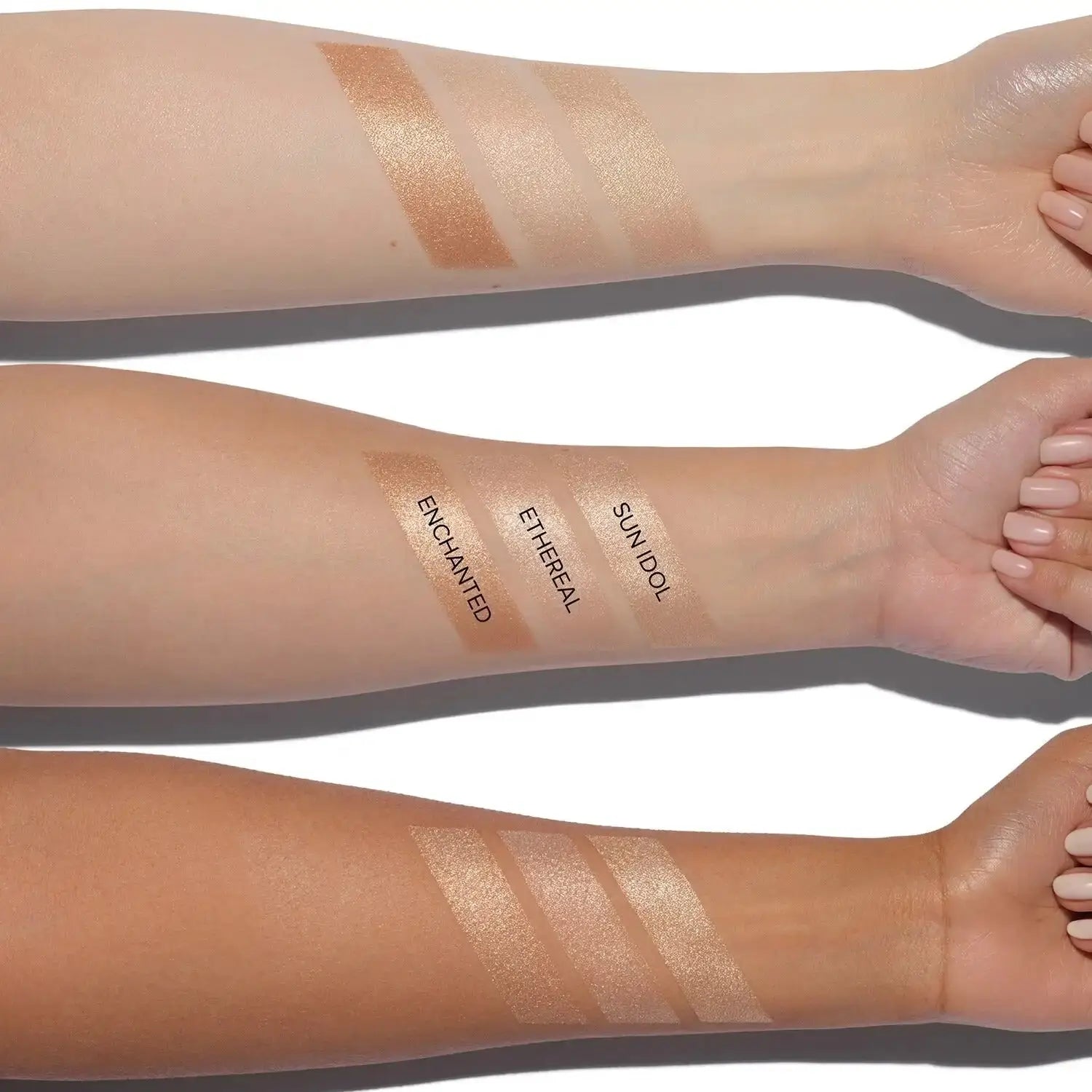 Swatch of Anastasia Glow Seeker Highlighter Sun Idol on arm showing champagne golden glow and shimmer