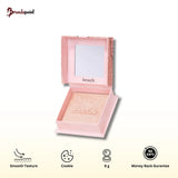 Benefit Cookie Highlighter Powder in its iconic branded compact, showcasing the golden shimmer for a radiant glow.
