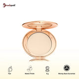 Charlotte Tilbury Airbrush Flawless Finish Powder Fair compact with loose powder visible, soft focus setting powder for fair skin