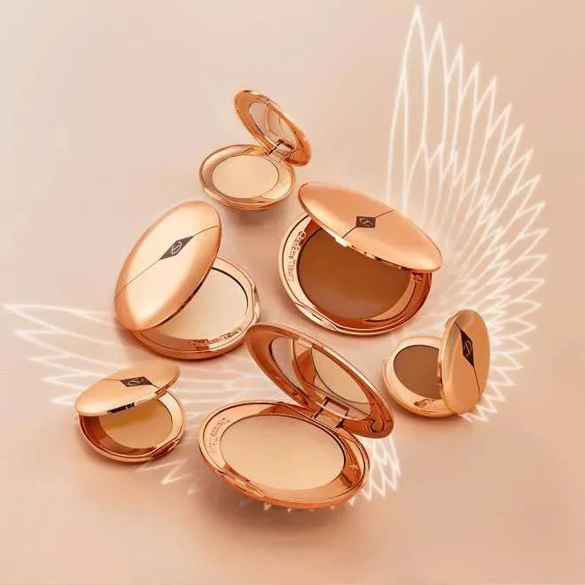 Application of Charlotte Tilbury Airbrush Flawless Finish Powder Medium with a brush, achieving airbrushed finish