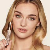 Swatch of Charlotte Tilbury Radiant Concealer 4 Fair on skin showing medium coverage