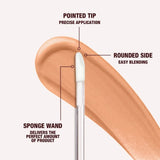 Application of Charlotte Tilbury concealer under eyes for brightening and lift effect