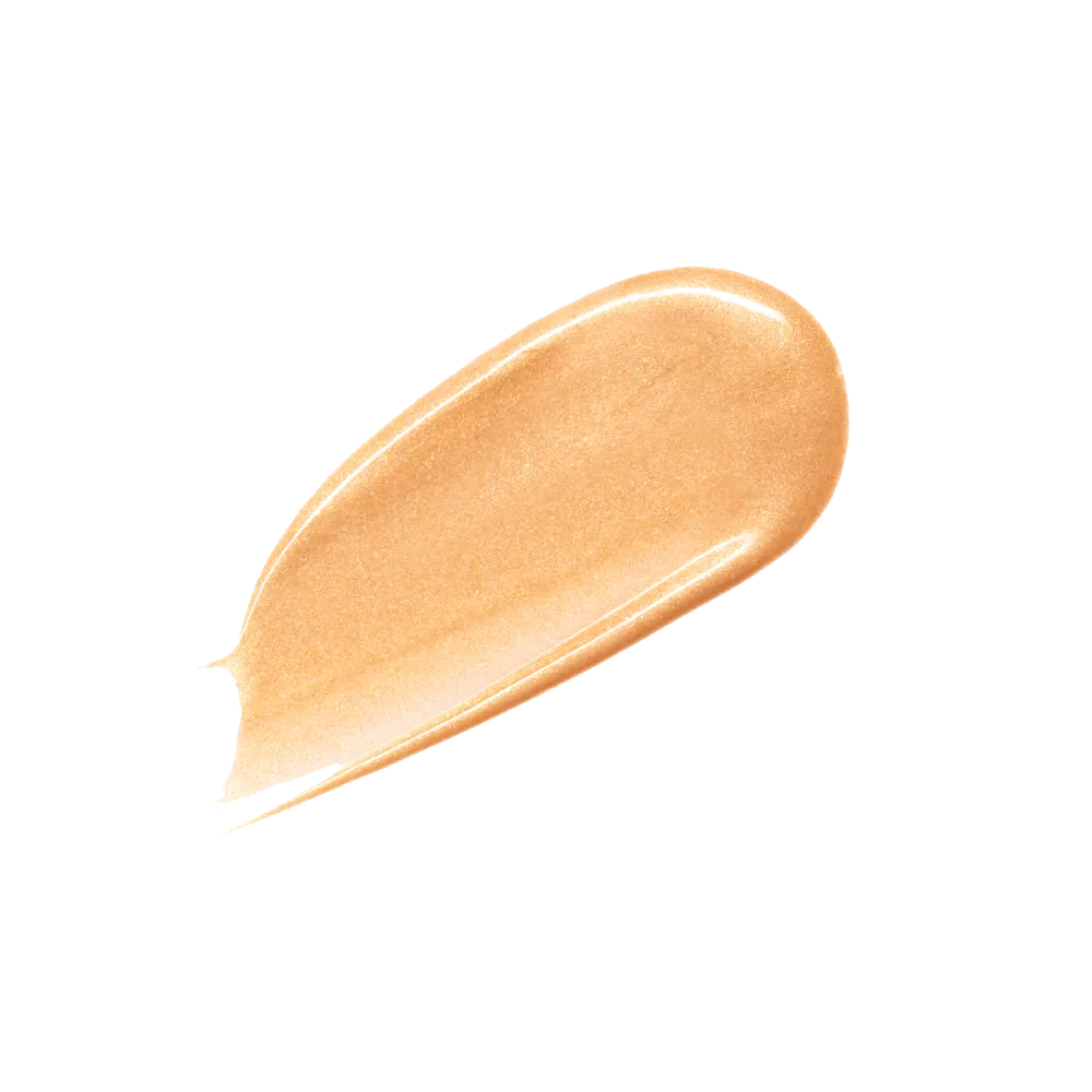 Charlotte Tilbury Goldgasm Beauty Light Wand highlighter swatch on skin