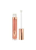 Charlotte Tilbury Collagen Lip Bath gloss applicator showing product texture and doe-foot wand