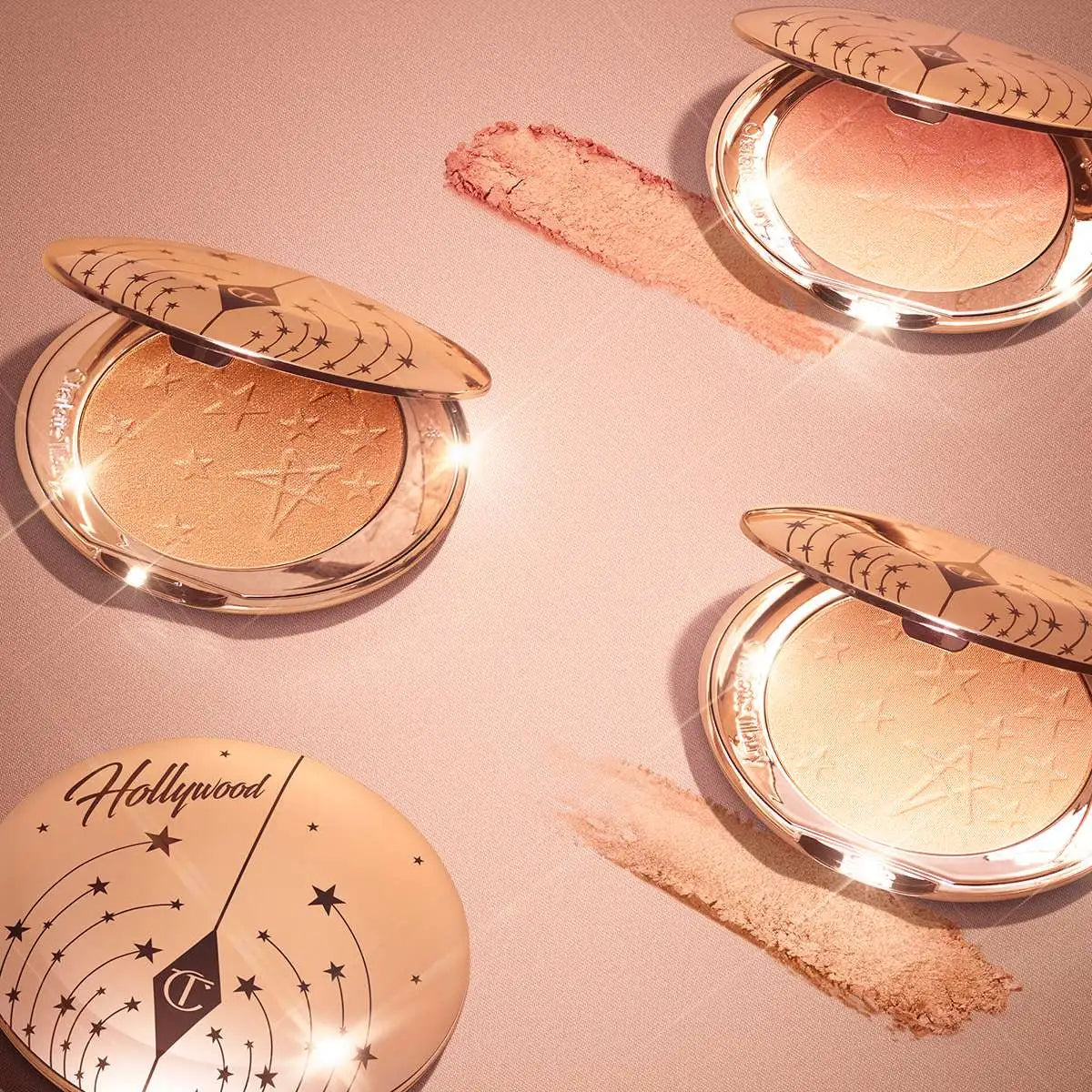 Charlotte Tilbury Pillow Talk Glow highlonder angled shot showing the golden case and subtle pink tone