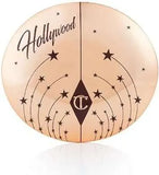 Charlotte Tilbury highlighter compact with pink lid and gold accents
