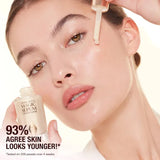 Application of Charlotte Tilbury Magic Serum on skin for hydration