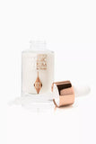 Charlotte Tilbury Magic Serum Crystal Elixir Mini 8ml close-up of bottle and dropper