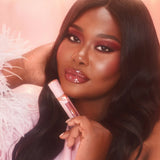 Charlotte Tilbury Pillow Talk Big Lip Plump shade Medium-Deep displayed with other Pillow Talk products