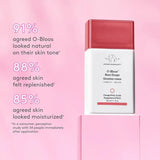 Close-up of Drunk Elephant O-Bloos Rosi Drops dropper dispensing liquid blush