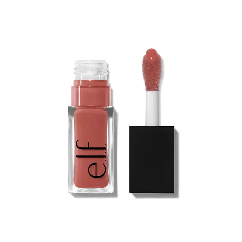 e.l.f. Glow Reviver Lip Oil in Pink Quartz with plush applicator, showcasing glossy hydrating finish on lips.