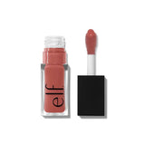 e.l.f. Glow Reviver Lip Oil in Pink Quartz with plush applicator, showcasing glossy hydrating finish on lips.