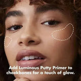Close-up of E.L.F. Luminous Putty Primer showing creamy luminous texture inside the jar.