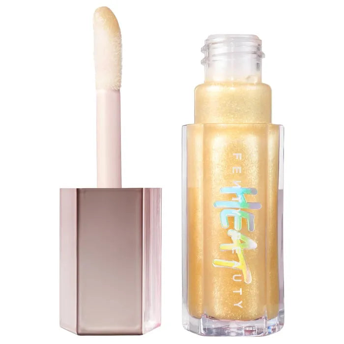 Fenty Beauty Gloss Bomb Heat Lip Luminizer Plumper 9ml tube in Lemon Lava, featuring the iconic Fenty Beauty branding.