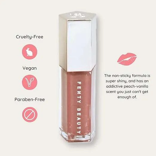 Fenty Beauty Gloss Bomb Lip Luminizer Fu$$y tube with glossy pink packaging and silver cap