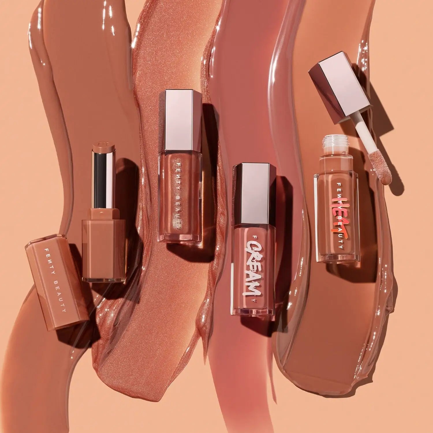 Fenty Beauty Gloss Bomb Stick The Mvp - close-up of the bullet showing color and shine