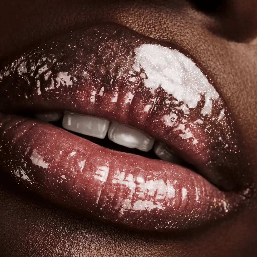 Fenty Beauty Gloss Bomb Hot Chocolit Fantasy lip gloss with shimmer detail