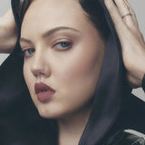 Fenty Beauty Icon Velvet Liquid Lipstick Riri - model wearing shade Riri