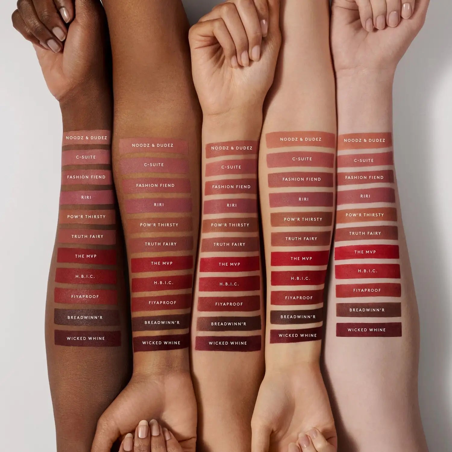 Fenty Beauty Icon Velvet Liquid Lipstick Riri - tube close-up with shine