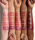 Fenty Beauty Poutsicle hydrating lip stain Zesty Bestie with other Fenty products for size reference