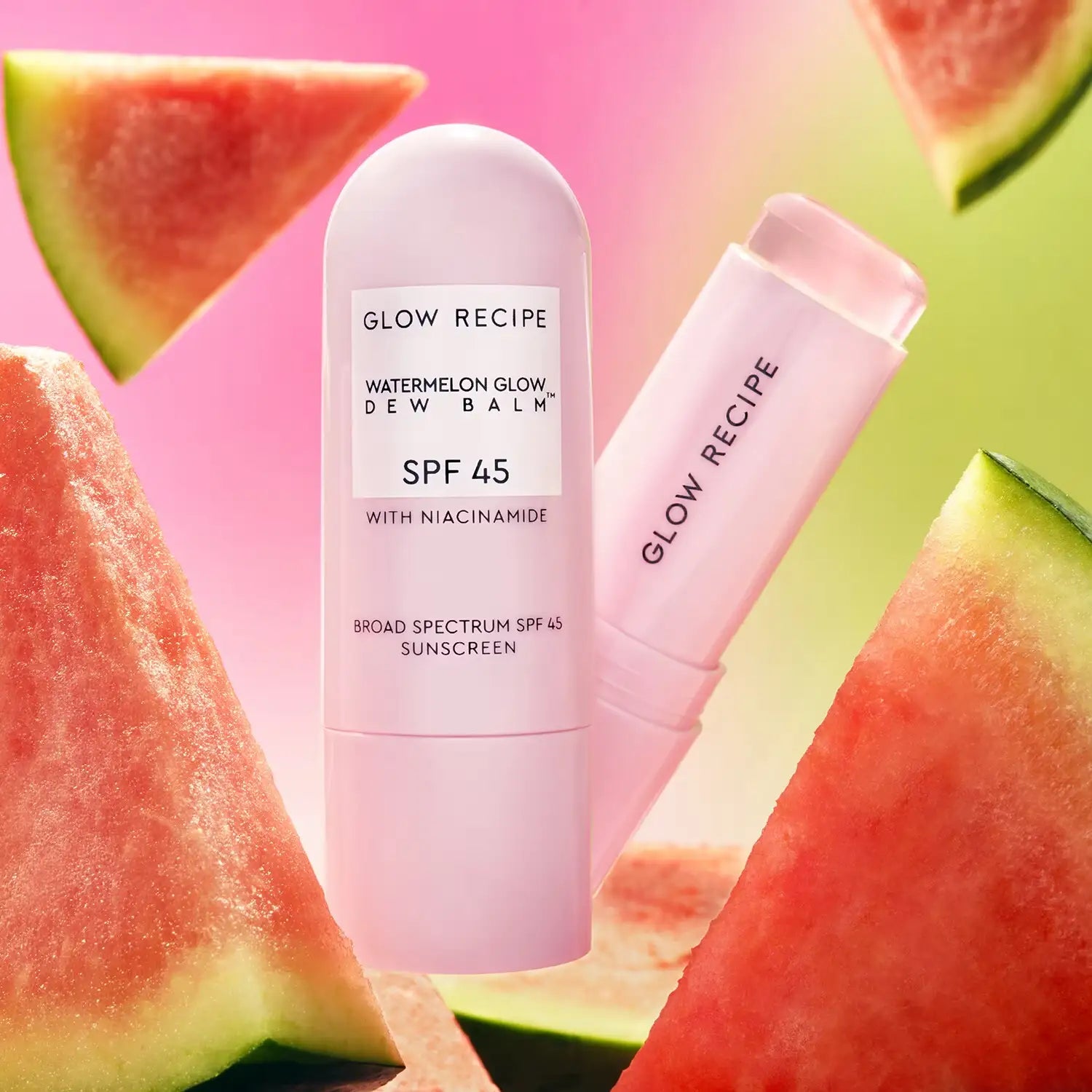 Packaging of Glow Recipe Watermelon Glow Dew Balm Sunscreen Stick with pink and green watermelon theme.
